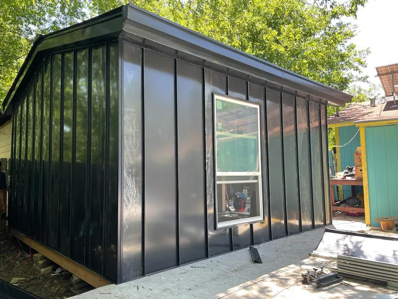 Black standing seam metal wall panels for Metal Roof Installation in Isla Vista